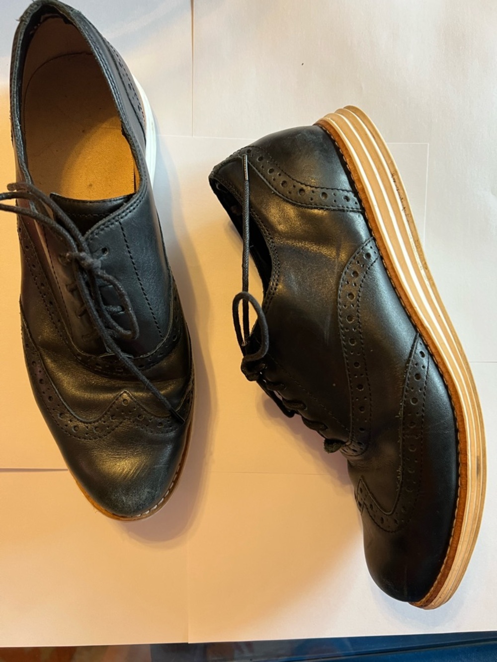 Cole Haan Black Leather Wingtip Loafers with white contrast Stacked Sole